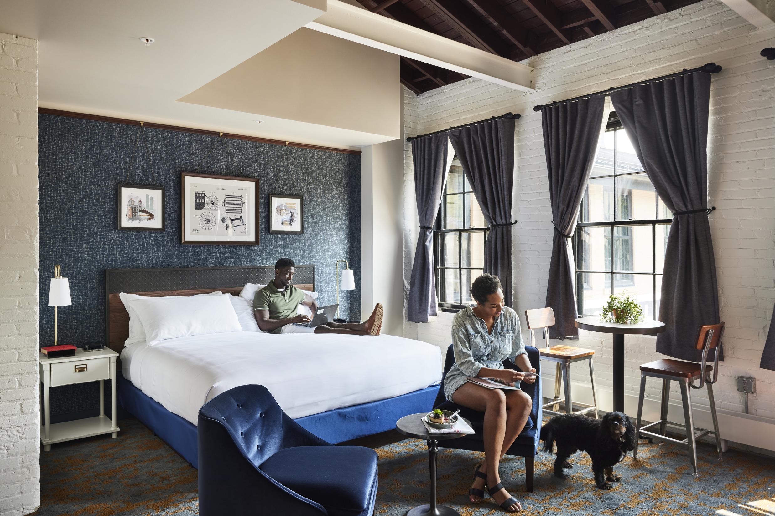 Couple relaxing in hotel suite
