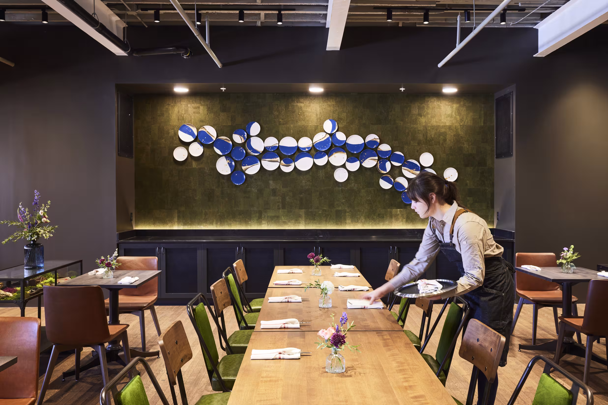 Waitress Setting Table